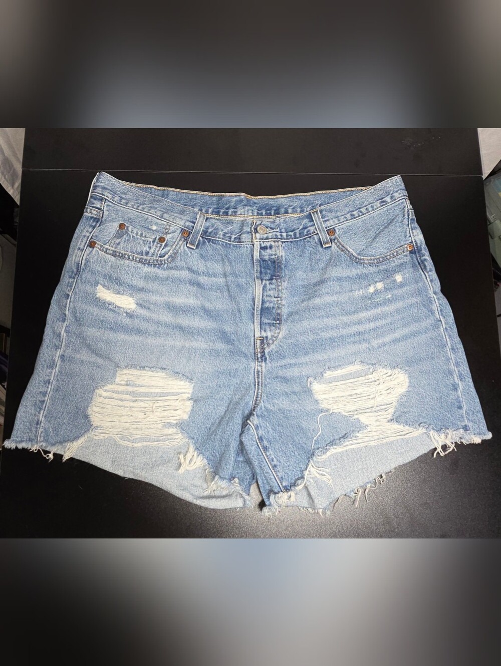 LEVI: Distressed Light Blue Women’s Denim Shorts